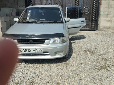грузовой автомобиль: Mazda Demio: 1998 г., 1.3 л, Автомат, Бензин, Универсал