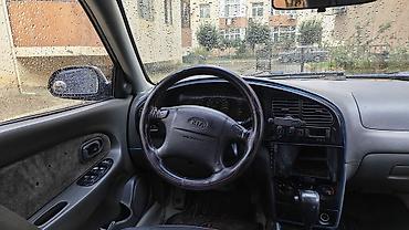 avto karavan: Kia Cerato: 1.8 l | 2002 il Sedan — 7
