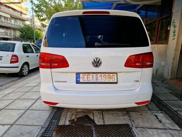 Transport: Volkswagen Touran: 1.6 l | 2012 year MPV