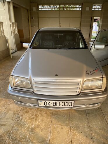 Polo köynəklər: Mercedes-Benz 240: 2.4 l | 1998 il Sedan