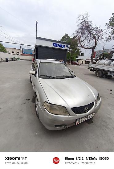 e53 amg: Mazda Familia: 2001 г., Универсал — 6