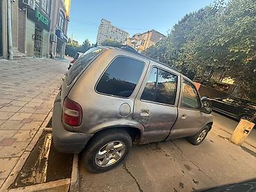 man sat: Marka—Kia Model—Sportage minik Buraxılış ili—2001 Ban növü‐–Universal — 7