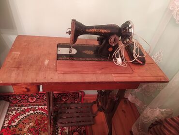 kohne tikis masini aliram: Швейная машина