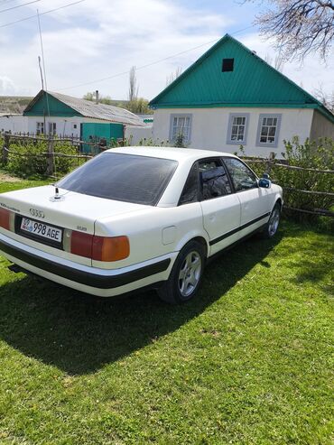 афто рынок каракол: Белый седан Audi 100 C4 с характерным обтекаемым кузовом. Автомобиль