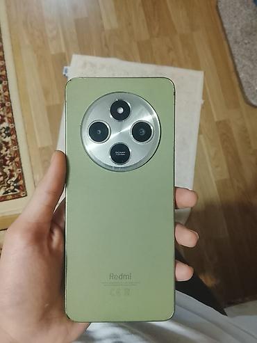canon 750 d: Salam Redmi smartfon – yaşıl rəng, dairəvi kamera modulu ilə — 2