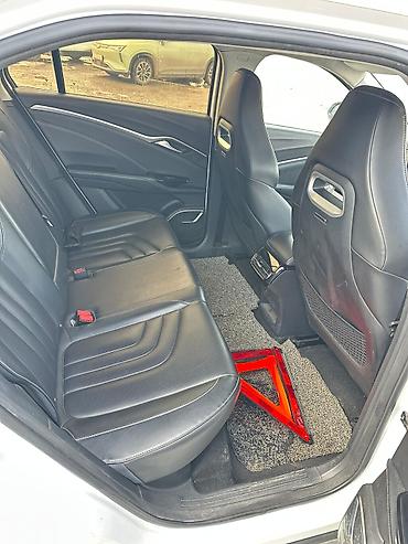 Другие автомобили: Электрокроссовер SWM EDi05 (белый цвет кузова) Кузов и дизайн: - — 7