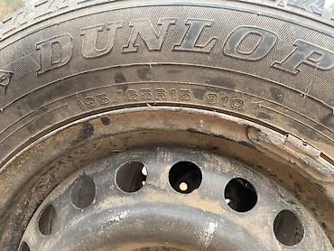 титан диска 15: Зимние шины Dunlop 195/65 R15 91Q на штампованных стальных дисках — 2