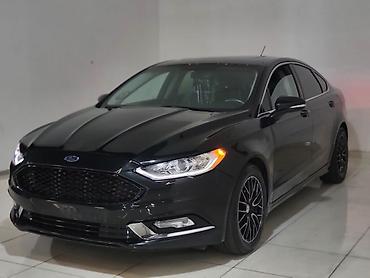 07 radiatoru: Ford Fusion sedan – qara rəng, aerodinamik kuzov və idman üslublu — 2