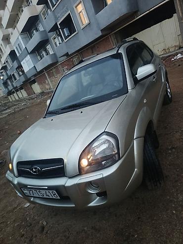 hundai tukson: Hyundai Tucson: 2 l | 2008 il Krossover — 1