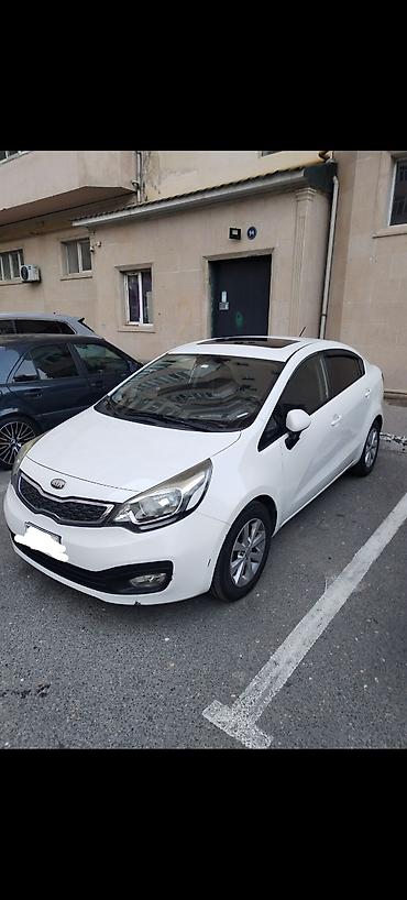 bora: Kia Rio: 1.4 l | 2013 il Sedan — 10
