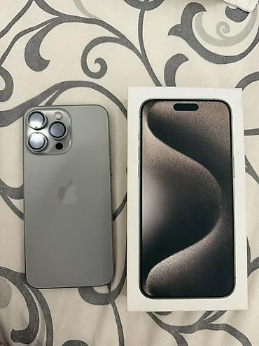 IPhone 15 Pro Max, цвет титаново‑серый,257 ГБ . В комплекте —