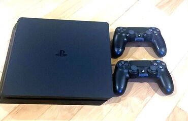 playstation 4: Sony Playstation 4 slim 1TB cox yaxsi veziyyetdedi. Evde seliqeli