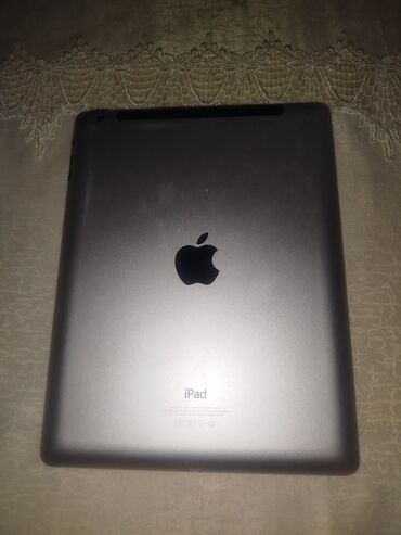 ipad ucuz: Apple iPad, istifadə üçün əlverişli, yığcam planşet. Arxa hissəsi