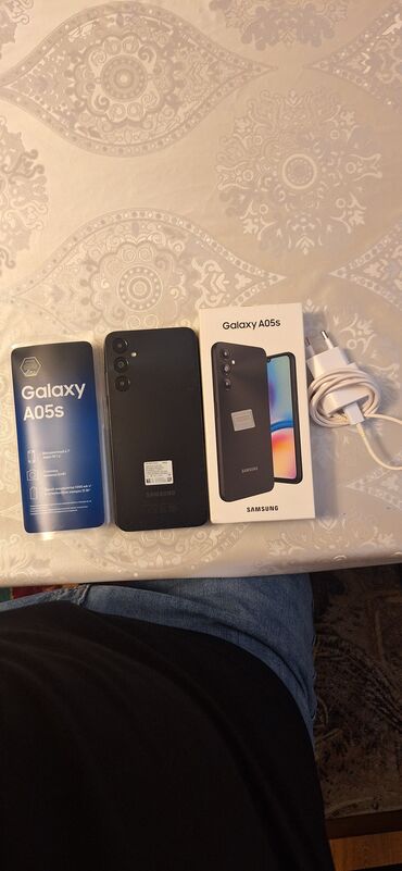 сотовый телефон fly ezzy: Samsung Galaxy A05s, 128 ГБ, цвет - Черный, Гарантия, Отпечаток пальца