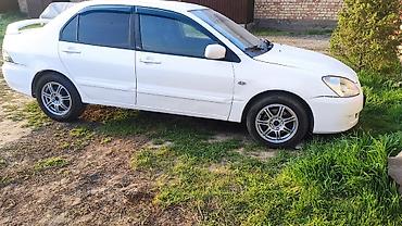 рул: Mitsubishi Lancer: 2006 г., 1.6 л, Автомат, Бензин, Седан — 3