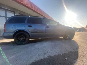 автомобиль фольксваген поло: Model: Opel Astra Caravan (universal kuzov) Rəng: tünd boz Yanacaq