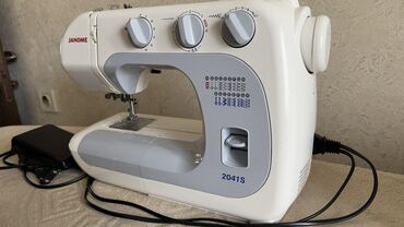 janome 500e: Тигүүчү машина Janome, Автомат