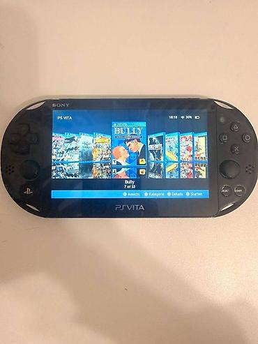 PS Vita (Sony Playstation Vita): Playstation vita ideal veziyyetdedir. Hec bir problemi yoxdu. Ciziqi — 5