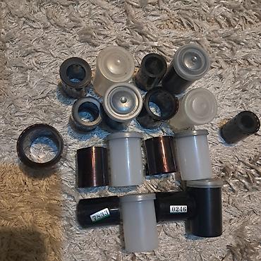 nömre daşınması: 35 mm foto plyonkası kasetləri və konteynerləri seti - Müxtəlif sayda — 1
