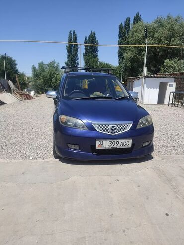 машыни: Mazda Demio: 2003 г., 1.5 л, Автомат, Бензин