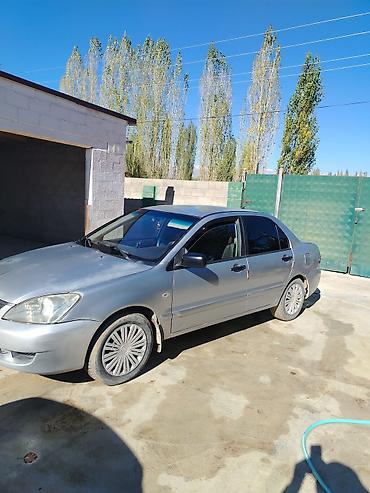 Mitsubishi Lancer: 2006 г., 1.6 л, Механика, Бензин, Седан