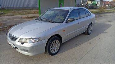 подсветка двери с логотипом марки автомобиля: Mazda 626: 2002 г., 1.8 л, Механика, Бензин, Седан