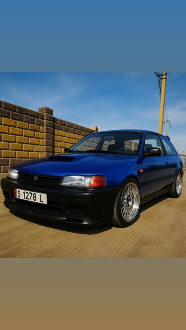 срочно продаю в связи с переездом: Mazda 323: 1990 г., 1.3 л, Механика, Бензин, Хетчбек