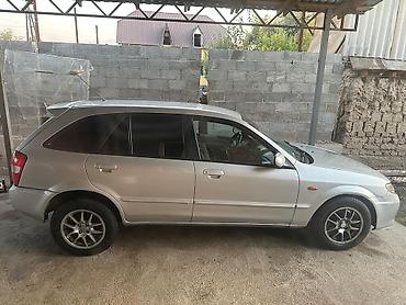 mazda 323 2003: Mazda 323: 2003 г., 1.6 л, Механика, Бензин, Хэтчбэк — 2