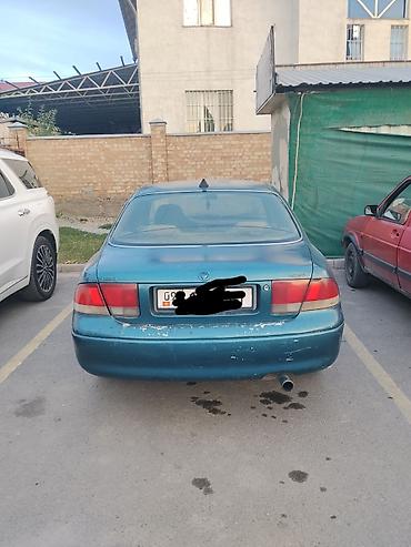 овальный: Mazda 626: 1993 г., 1.8 л, Механика, Бензин, Седан — 2