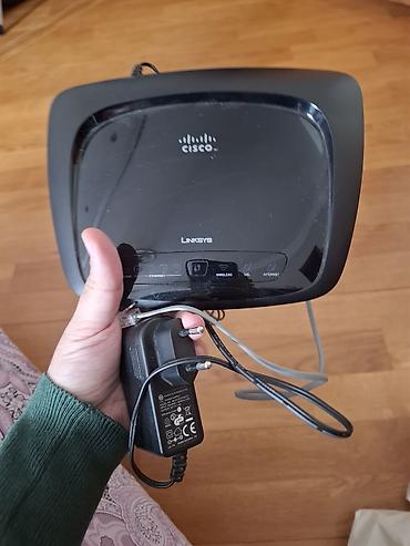 Linksys (Cisco) Wi‑Fi router - Brend: Linksys by Cisco - Tip: Simsiz