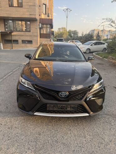 цена машин: Toyota Camry 70 Hybrid LE Кузов: седан, цвет — черный Объем 2.5 гибрид