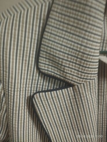 Пиджаки, жакеты: Элегантный женский пиджак с укороченным рукавом, выполненный в — 5