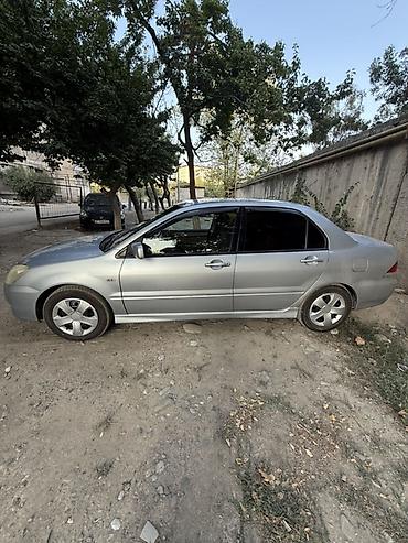 highlander platinum: Mitsubishi Lancer: 2003 г., 1.6 л, Механика, Бензин, Седан — 4