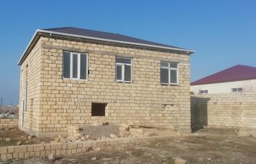 xırdalan kiraye evlər: İki mərtəbəli,daşdantikilmiş bu ev tikinti mərhələsindədir. Binanın