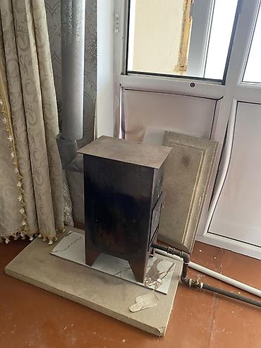 qapi dekoru: Metaldan hazırlanmış odun sobası - Korpus: qalın metal, kompakt — 1