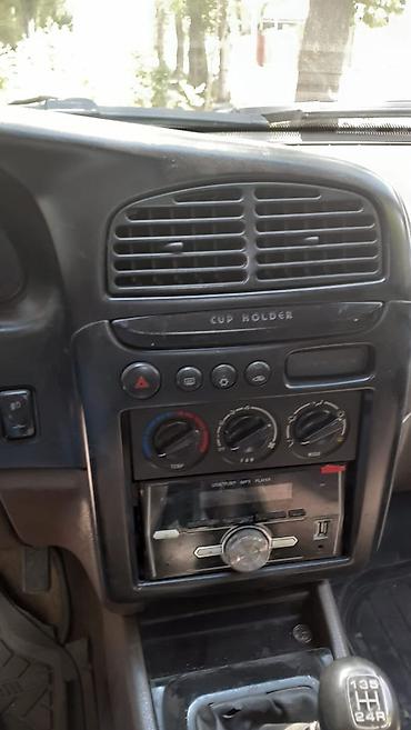 Kia: Kia Sportage: 2000 г., 2 л, Механика, Дизель, Внедорожник — 11