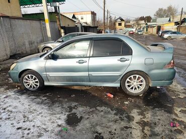 ланс: Mitsubishi Lancer: 2006 г., 2 л, Механика, Газ, Седан