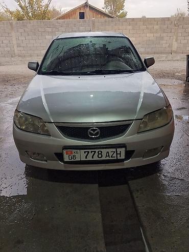 х5 м: Mazda Familia: 2001 г., Бензин, Универсал — 1