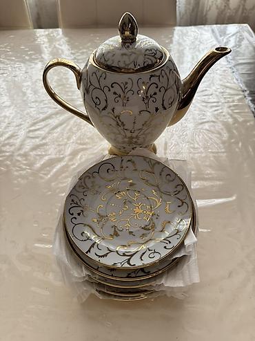 Рыбы: Porcelain çay dəsti – zərif qızılı naxışlı Məhsulun tərkibi: - 1 ədəd — 2