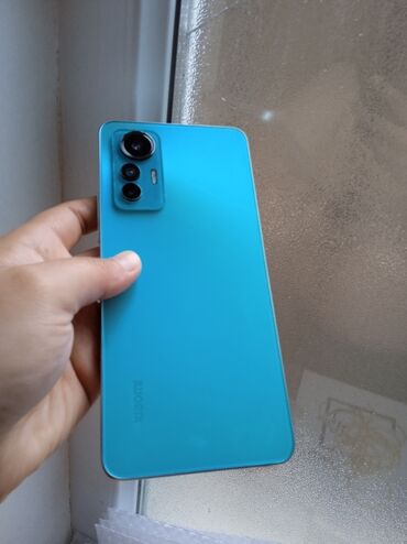 телефон fly ezzy: Xiaomi Mi 12 Lite, 128 ГБ, цвет - Синий, 
 Отпечаток пальца, Две SIM карты