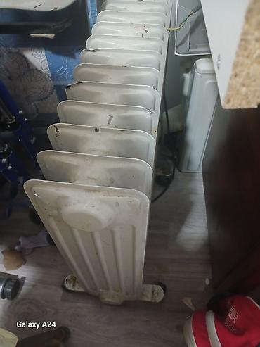 yag peci satilir: Yağ radiatoru satılır.dəmmir döküm Ağ rəngli, çox bölməli elektrik — 1
