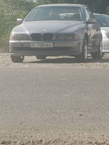 авто тойота авенсис: Автомобиль BMW 5-й серии в кузове E39 серого цвета. Эта модель