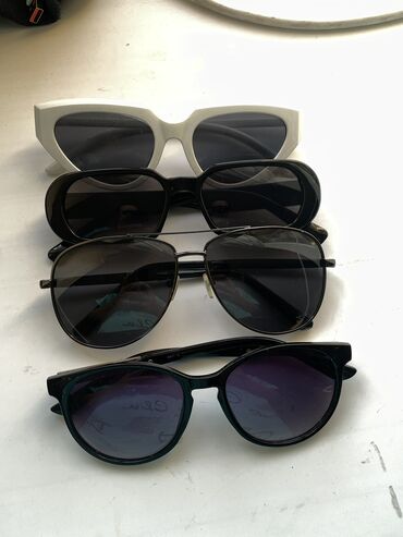 солнцезащитные очки: Очки солнцезащитные все за 200 сом