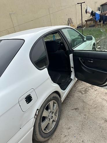Subaru: Subaru Legacy: 2003 г., Седан — 7