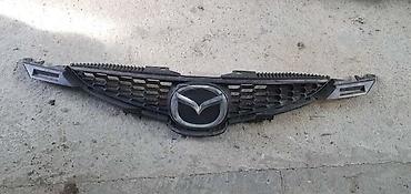 cari online: MASKA ZA MAZDA 2 — 1