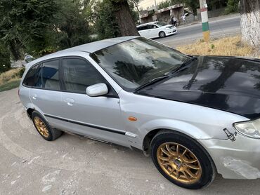 расрочкага машиналар: Mazda 323: 2002 г., 1.6 л, Механика, Бензин, Универсал