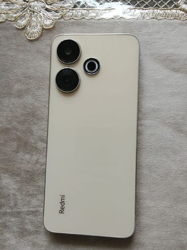 mobil wifi: Salam redmi 13 256 yadaş satılır heç bir problemi yoxdur bir də ekran