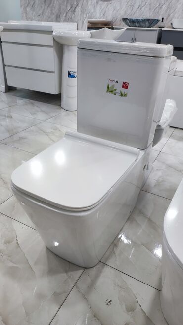 Təmir və tikinti: Ağ rəngdə "Cotton" markalı unitaz, müasir dizaynı ilə hamam otaqları
