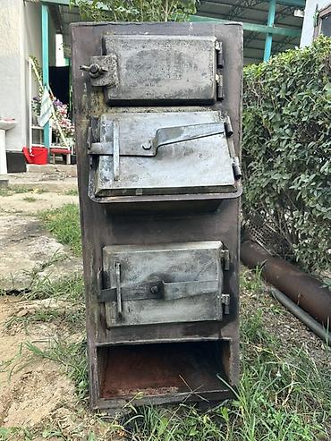Буржуйки: Металлическая твердотопливная печь- для парового отопление с тремя — 3