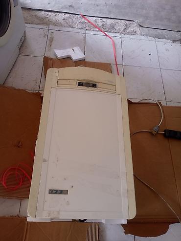 irsad electronics sobalar: İsti su və isitmə üçün qaz kombi - Model: Confeo U 23 (ön paneldə — 1
